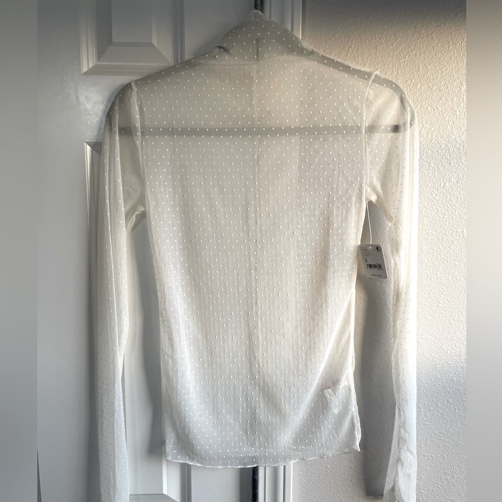 Free People “Intimately” white polka dot sheer shirt